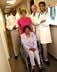 Picture of a group of physicians and patient